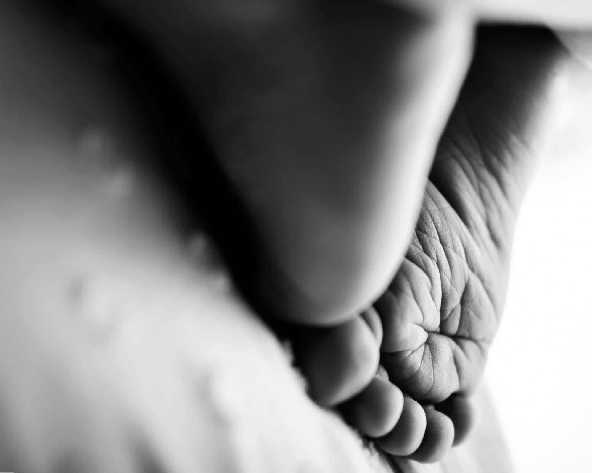 tiny feet in a leeds newborn photography studio